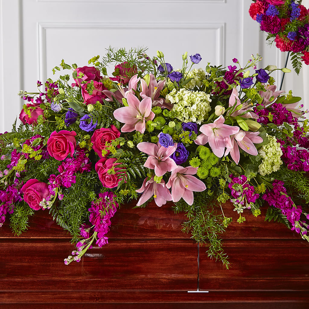 Radiant Tribute Casket Spray – Blooming Flowers, Mobile AL